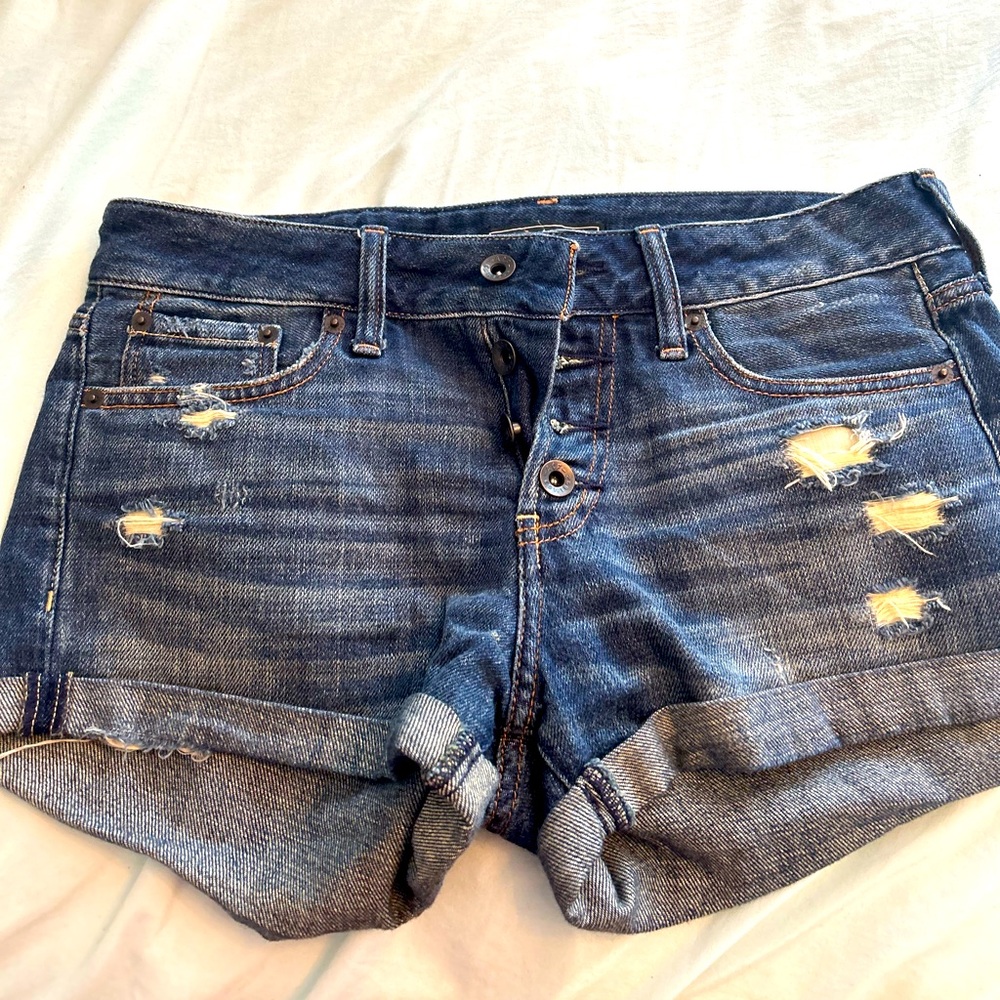 these are dark blue very nice jean shorts. They have only been worn once.